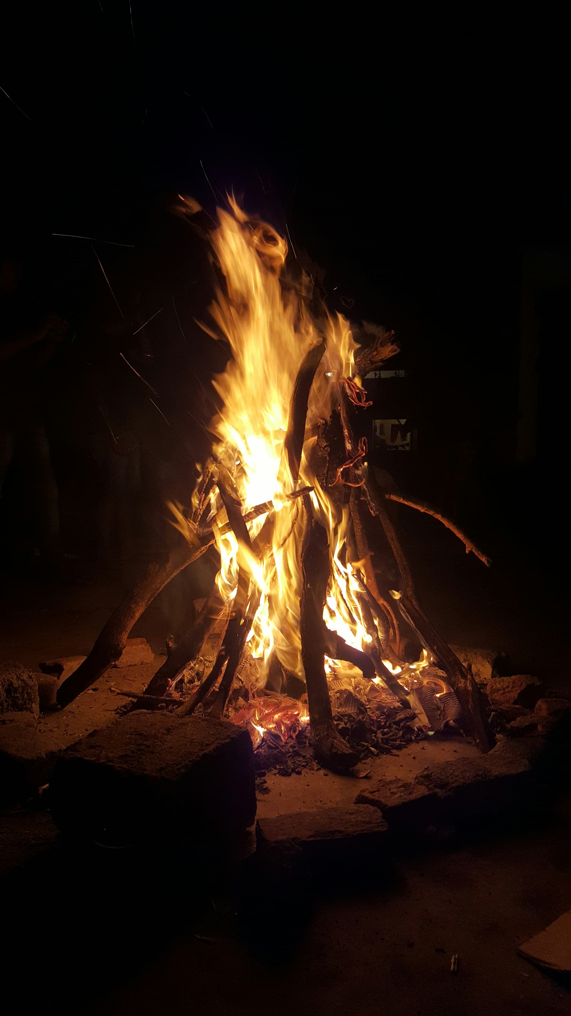 A bonfire burning at night